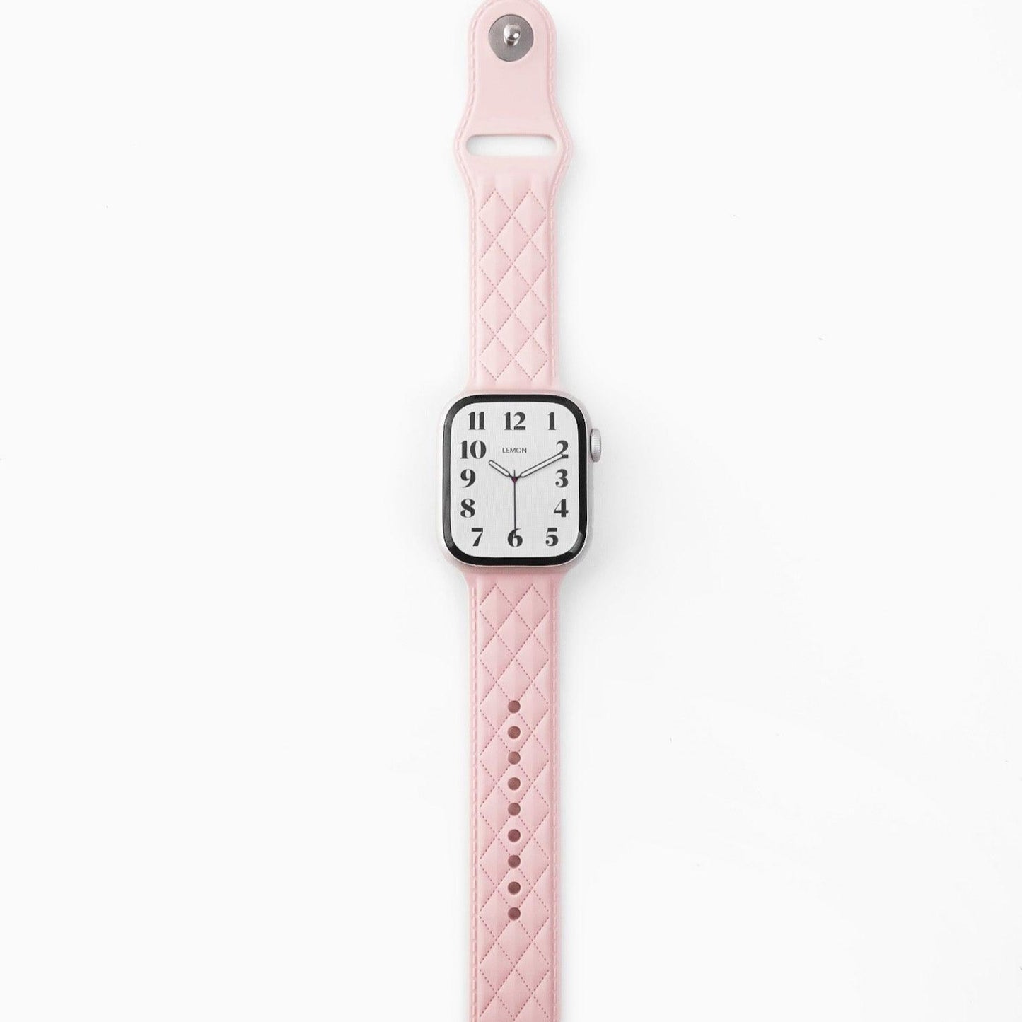 A pink lattice-patterned rubber band for Apple Watch.