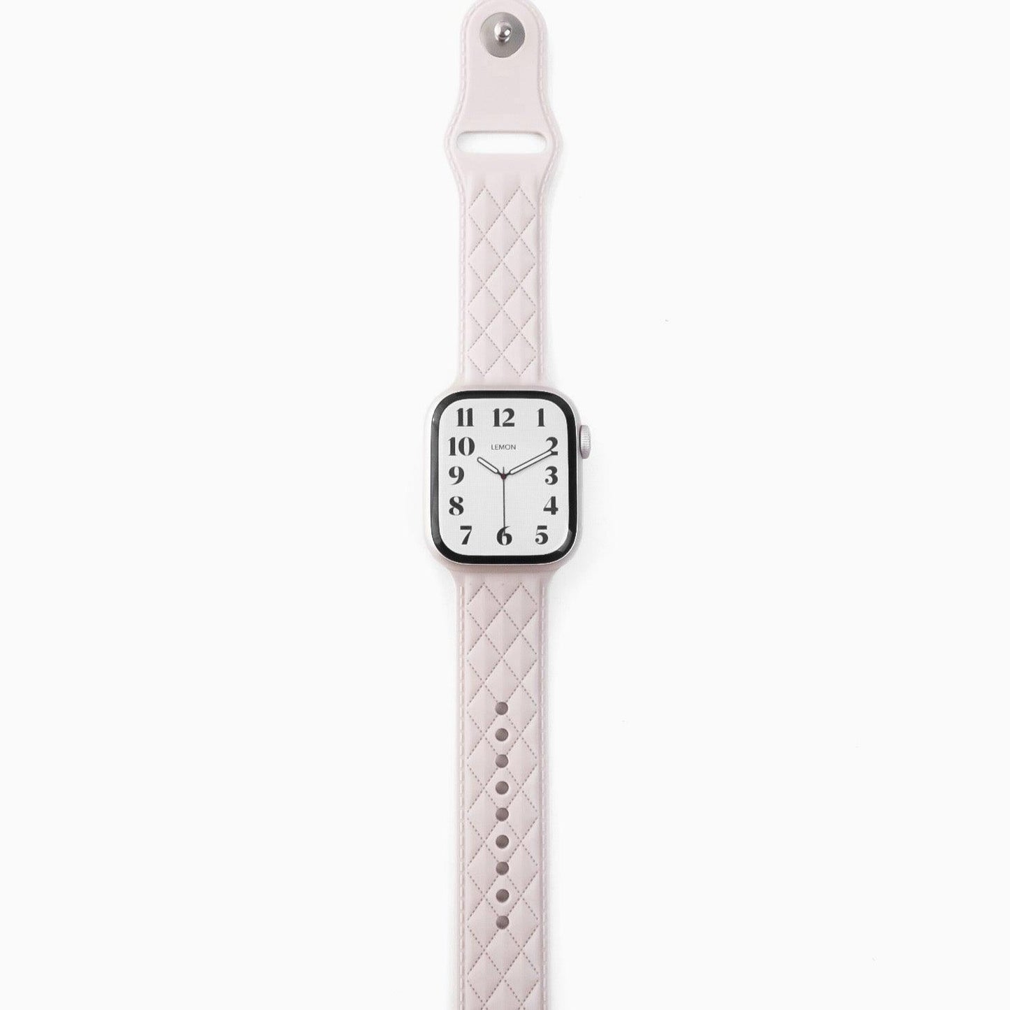 A white lattice-patterned rubber band for Apple Watch, displayed on a white background.