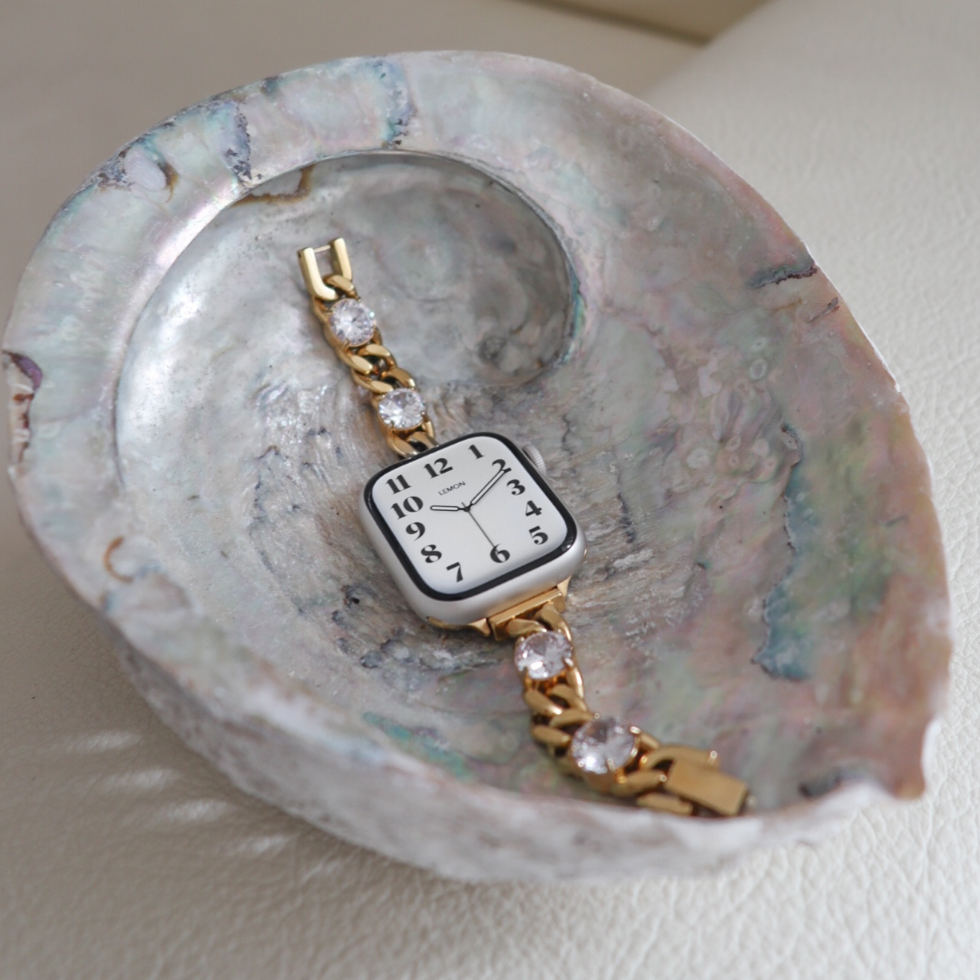 Gold APPLE  watch with diamond accents