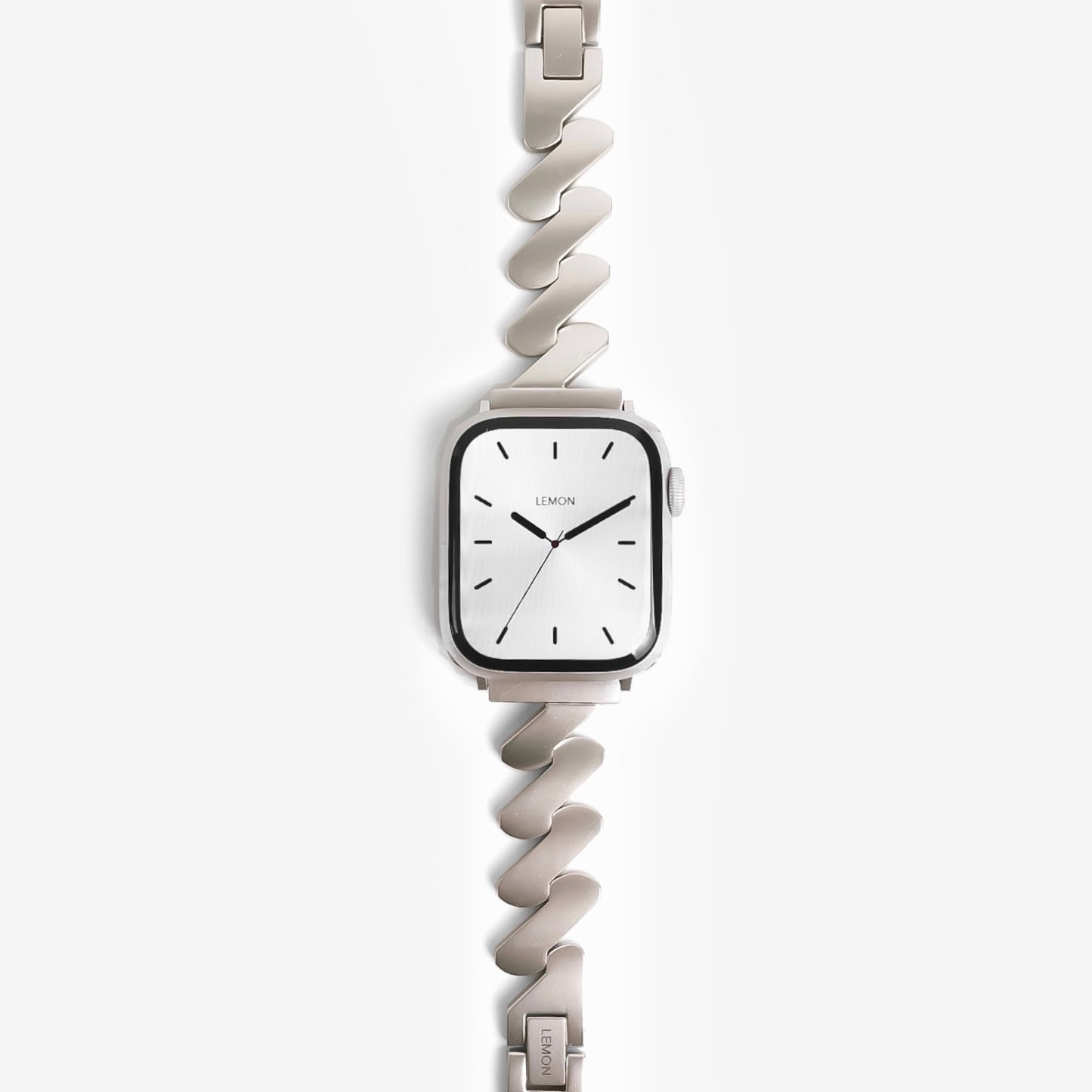 White watch with a unique strap design on a white background